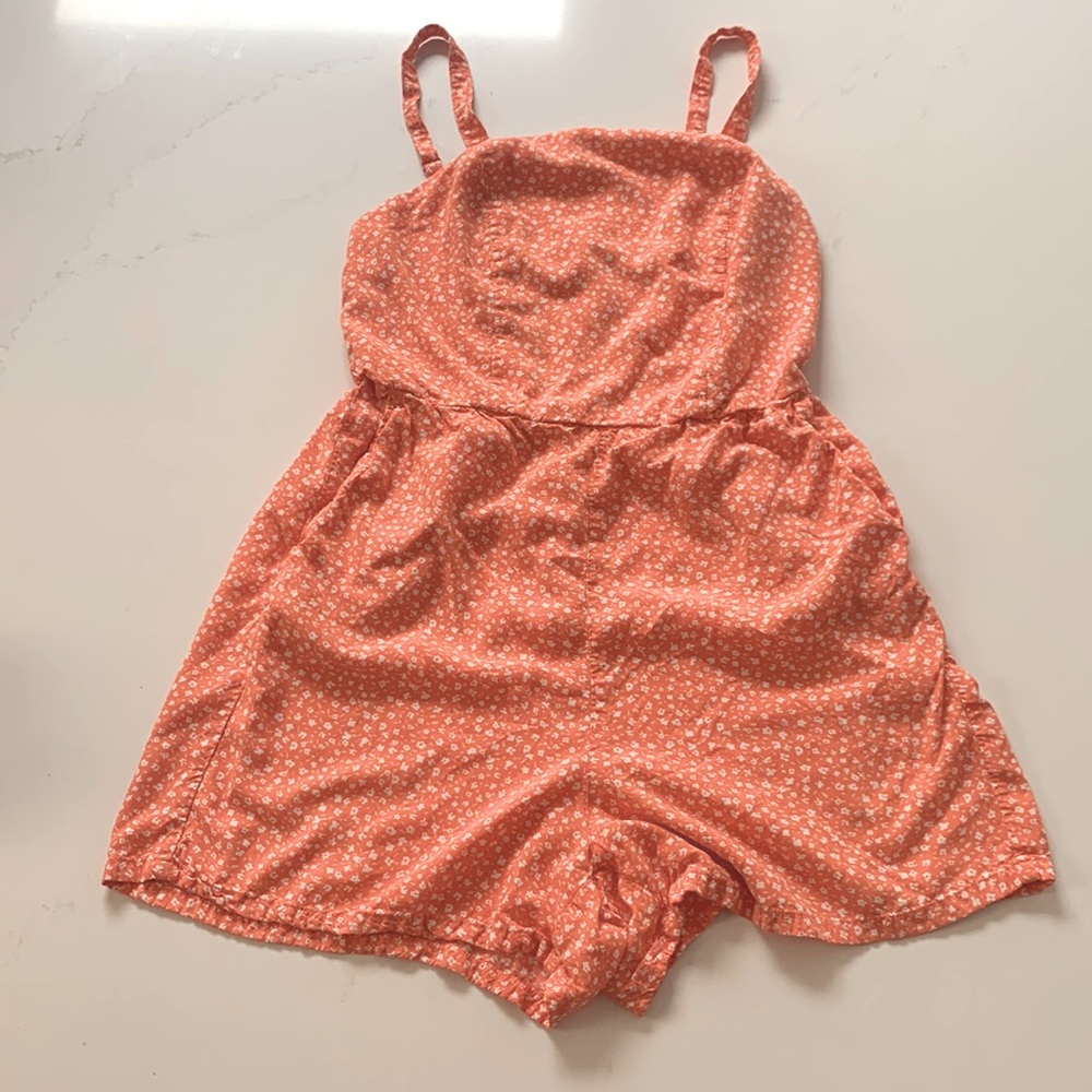Coral colored floral romper, great condition.